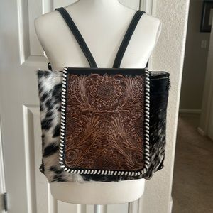 Cowhide and pleather backpack